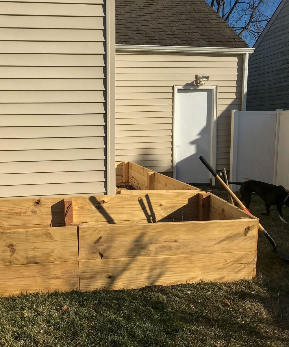 Image of two raised garden beds in an l-shape