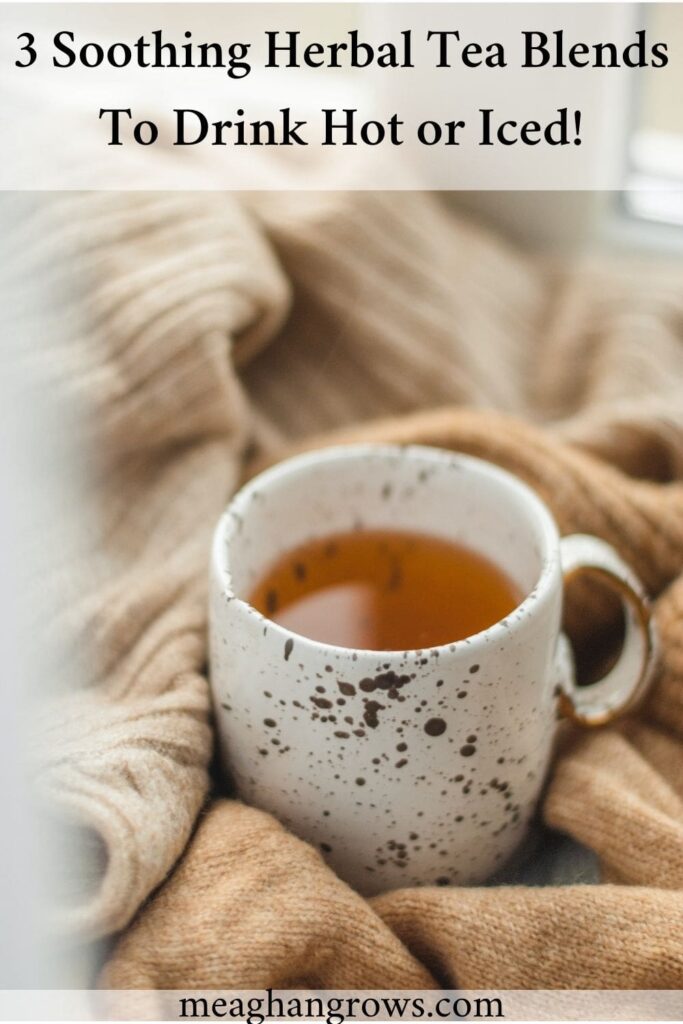 Pinterest pin containing the image of a white and black speckled mug of tea sitting on a windowsill with a tan throw blanket. Black text reads, "3 soothing herbal tea blends to drink hot or iced!" and "meaghangrows.com" – herbal tea recipes
