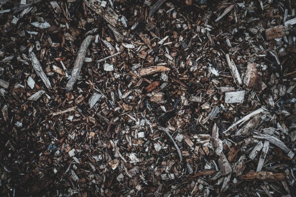 Overhead view of a woody pile of compost feed the soil