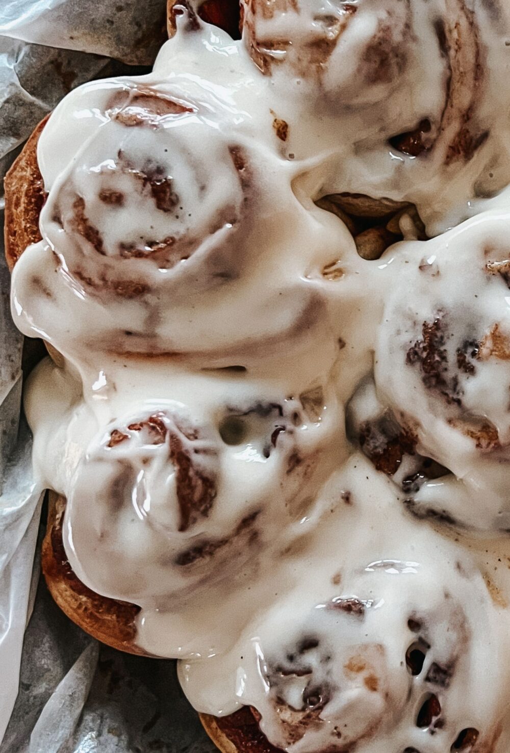 Close up of iced sourdough cinnamon rolls (right side)